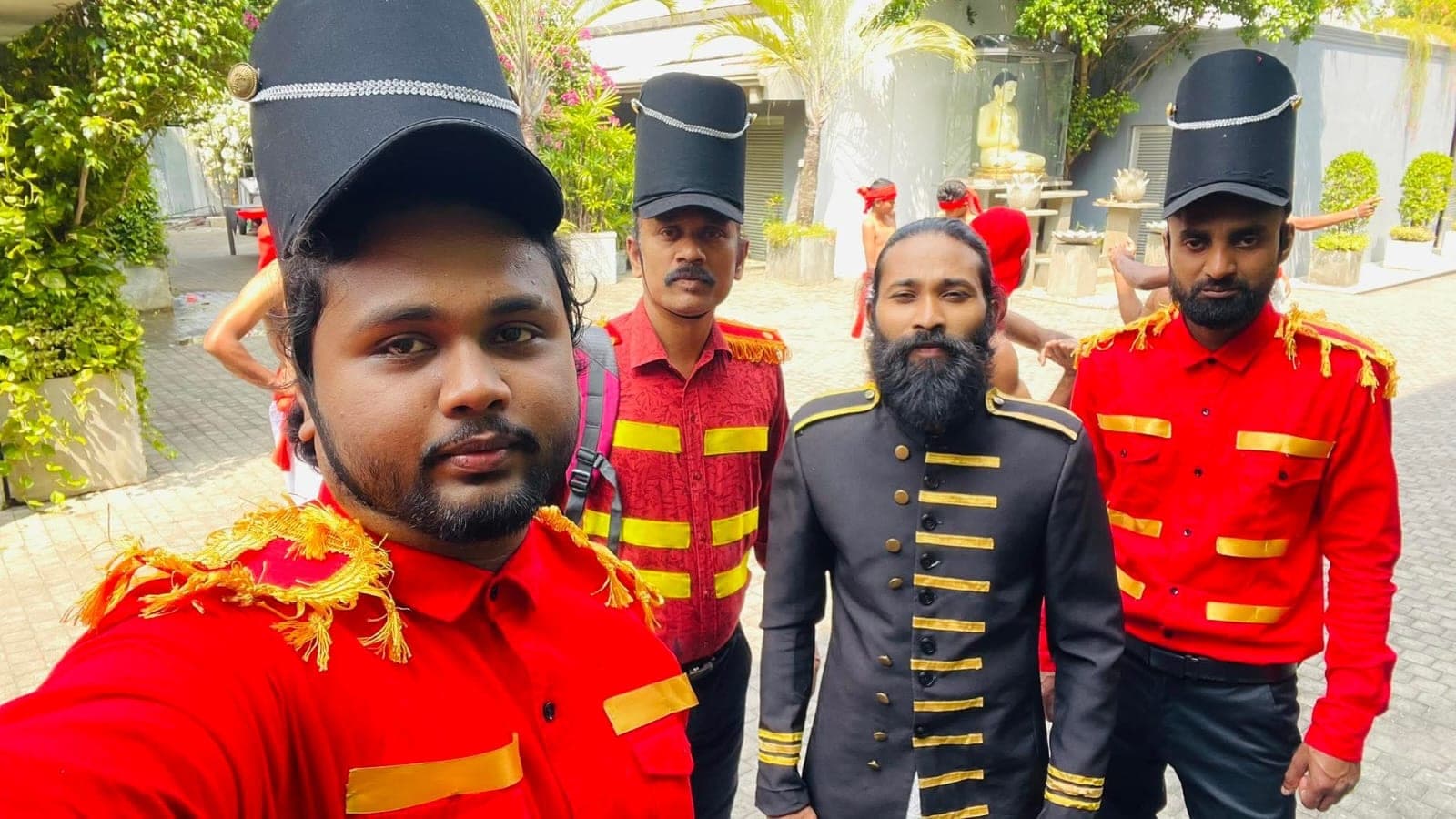 Kushan Neranjana with performers in period uniform at a history drama